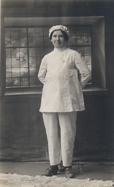 Featured is an early 20th century postcard image of a woman wearing work apparel.  The question: What type of work or occupation?  Nurse? Pastry Chef? Anybody have a definitive answer as to what type of uniform the lady is wearing?  The pin is a clue for sure.  The original unused postcard is for sale in The unltd.com Store.